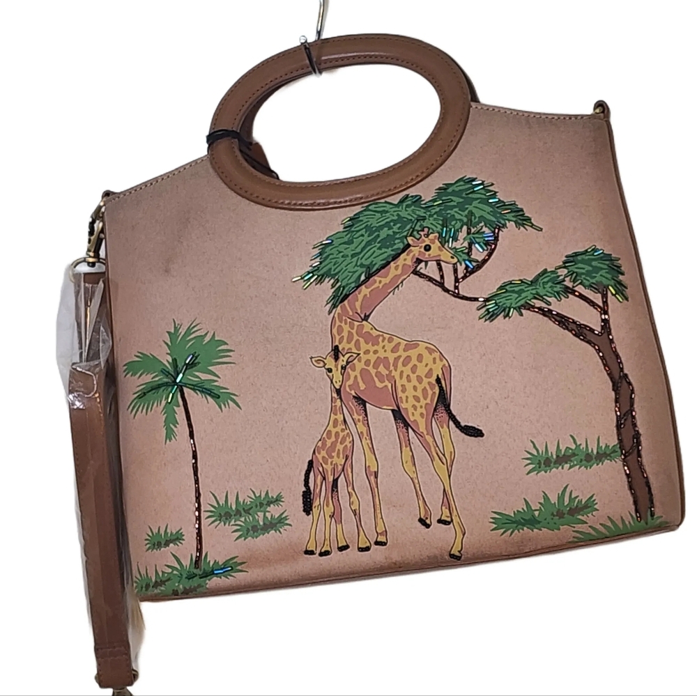 Marlo. Handbag w/ Printed Giraffe scene on natural fabric w/ bead detail.